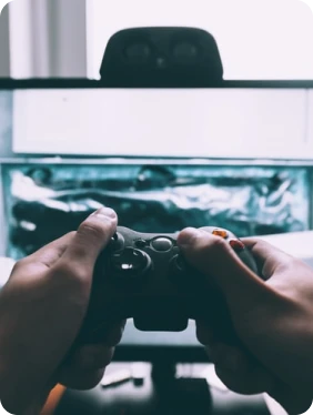 Person working on laptop by the ocean